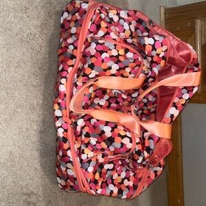 Like new Vera Bradley bag with wheels not sure what the design is called